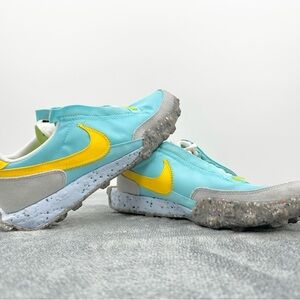 The Nike Waffle Racer Crater CT1983-400 in Bleached Aqua Blue Yellow